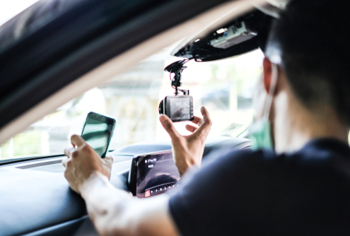 Dashboard camera recording an automobile accident on a Florida road, dashcam car accident claim
